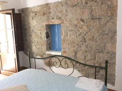 Letto o letti in una camera di Casa Camilla Sardegna