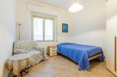 Letto o letti in una camera di GuestHost - Monserrato Cozy Apartment near the Policlinico!