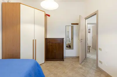 Letto o letti in una camera di GuestHost - Monserrato Cozy Apartment near the Policlinico!