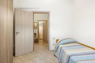 Letto o letti in una camera di GuestHost - Monserrato Cozy Apartment near the Policlinico!