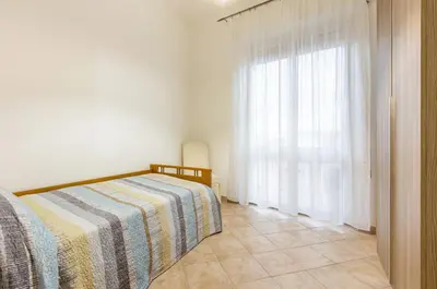 Letto o letti in una camera di GuestHost - Monserrato Cozy Apartment near the Policlinico!