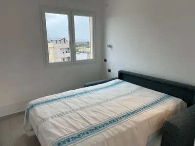 Letto o letti in una camera di Terrazza panoramica Frau
