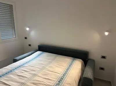 Letto o letti in una camera di Terrazza panoramica Frau