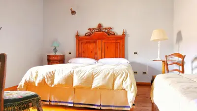 Letto o letti in una camera di Il Borgo dell'Arcangelo