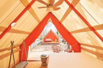 Letto o letti in una camera di LAVITA Camp - Capitana Villasimius