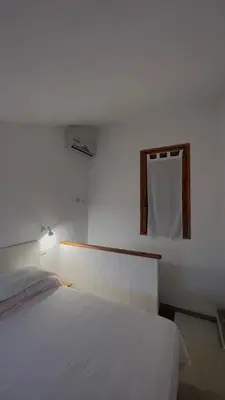 Letto o letti in una camera di Carlotta's house Villasimius