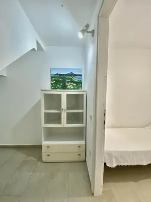 Letto o letti in una camera di Carlotta's house Villasimius