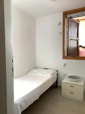 Letto o letti in una camera di Carlotta's house Villasimius