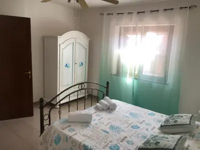 Letto o letti in una camera di Green Apartment