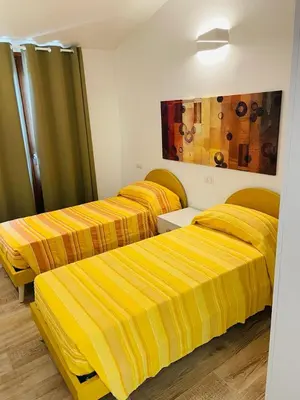 Letto o letti in una camera di Mauris Home