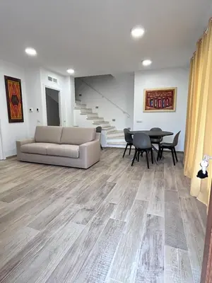 Area soggiorno di Mauris Home