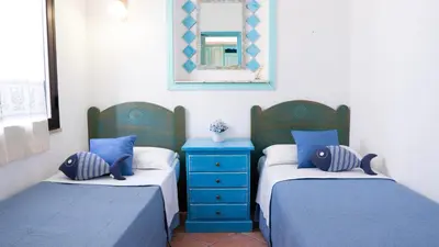 Letto o letti in una camera di The sound of the sea -Amazing villa 30mt from the beach