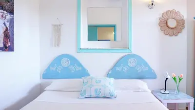 Letto o letti in una camera di The sound of the sea -Amazing villa 30mt from the beach