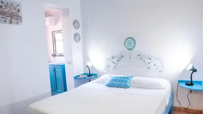 Letto o letti in una camera di The sound of the sea -Amazing villa 30mt from the beach