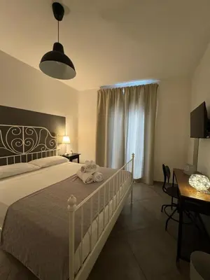 Letto o letti in una camera di L'obiettivo
