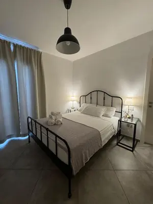 Letto o letti in una camera di L'obiettivo