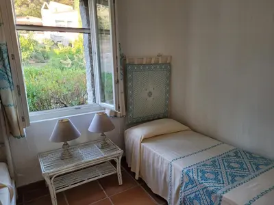 Letto o letti in una camera di Li Conchi Villa 17