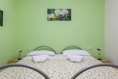Letto o letti in una camera di Casa Nonno