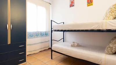 Letto o letti in una camera di Luisa Sunny House