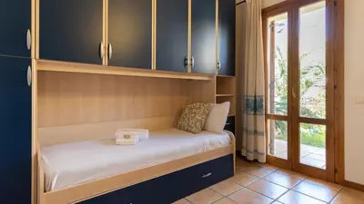Letto o letti in una camera di Luisa Sunny House