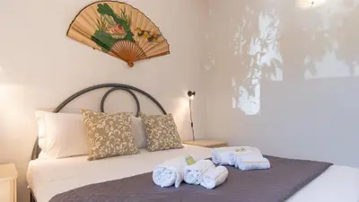 Letto o letti in una camera di Luisa Sunny House