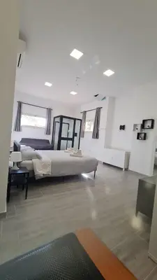 Letto o letti in una camera di Via Contu