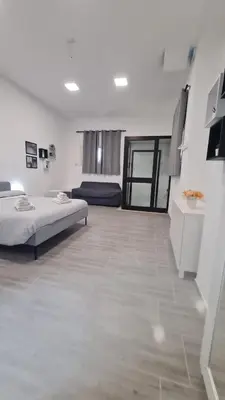 Letto o letti in una camera di Via Contu