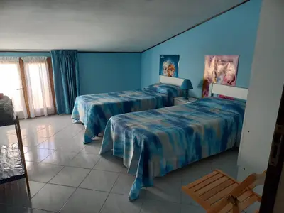 Letto o letti in una camera di Casa Giuly