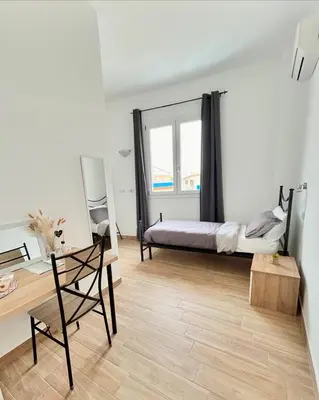 Letto o letti in una camera di Marina Casa Vacanza