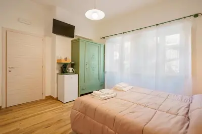 Letto o letti in una camera di NonnAdele