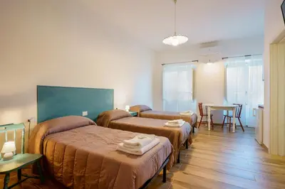 Letto o letti in una camera di NonnAdele