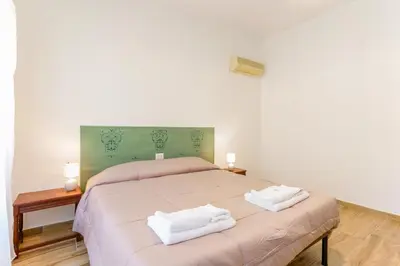 Letto o letti in una camera di NonnAdele