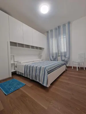 Letto o letti in una camera di CASA REALIZZA