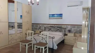 Letto o letti in una camera di Casa vacanze Le Gallinelle