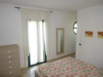 Letto o letti in una camera di GuestHost - La Casa Papavero in the Centre of Pula!