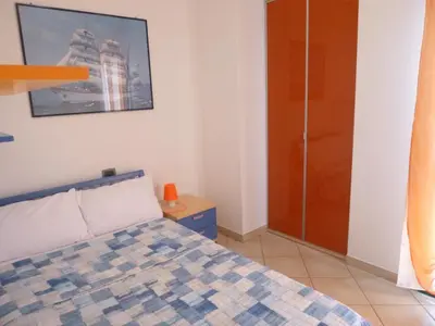 Letto o letti in una camera di GuestHost - La Casa Papavero in the Centre of Pula!