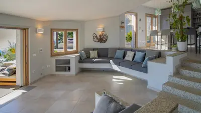 Area soggiorno di BeLocations - Villa and Beach On The Rocks