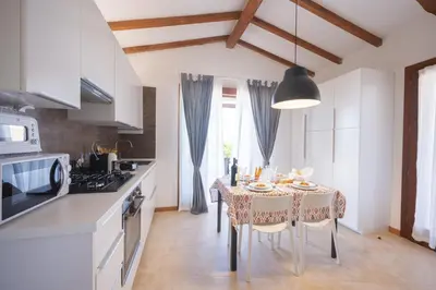 Cucina o angolo cottura di Villa Ajò - Is Molas (service fee waived)