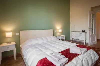 Letto o letti in una camera di ExmA Luxury Apart Cagliari Center Reserved Parking