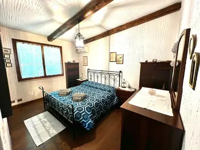 Letto o letti in una camera di Da Paolo e Lilli