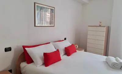 Letto o letti in una camera di Nel cuore di Oristano