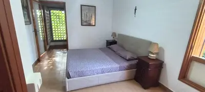 Letto o letti in una camera di Villa Sole e Mare