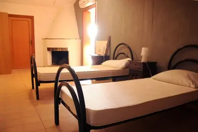 Letto o letti in una camera di Villa Sole e Mare