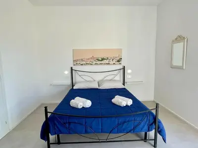 Letto o letti in una camera di Poetto Beach House - Molara1