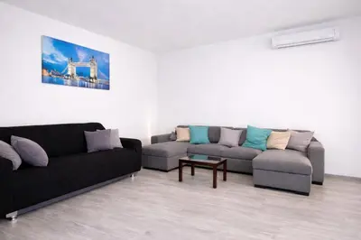 Area soggiorno di Bonòra Suites