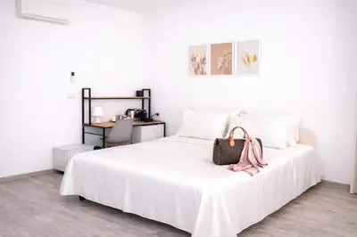 Letto o letti in una camera di Bonòra Suites