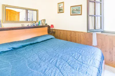 Letto o letti in una camera di Lillà - Villa A Solanas