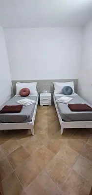 Letto o letti in una camera di Chia Sweet Home