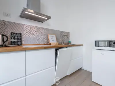 Cucina o angolo cottura di White Dream Apartment