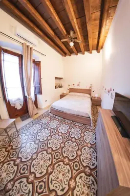 Letto o letti in una camera di A cà da Ruziña